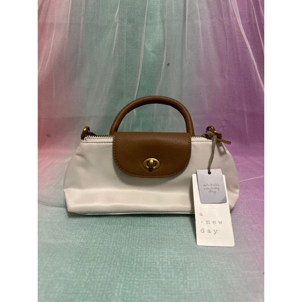 A. New day Crossbody handbag